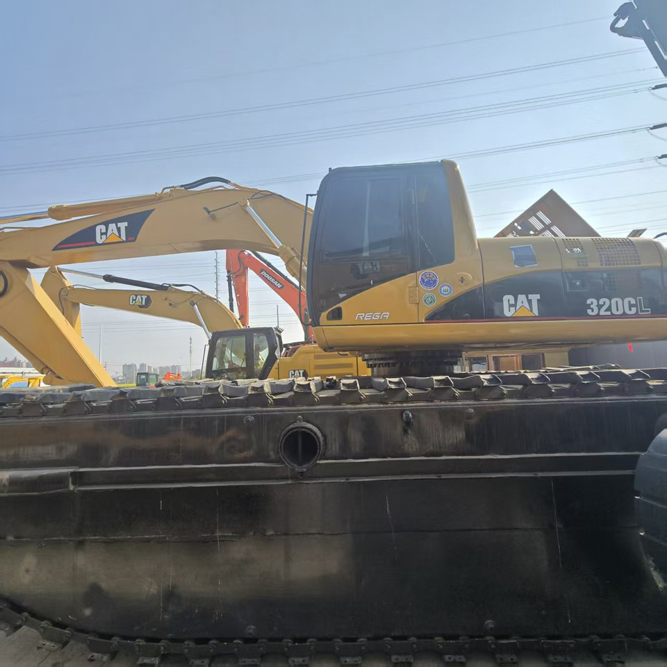 Caterpillar 320C - Amphibische Bagger: das Bild 5 Caterpillar 320C - Amphibische Bagger: das Bild 5