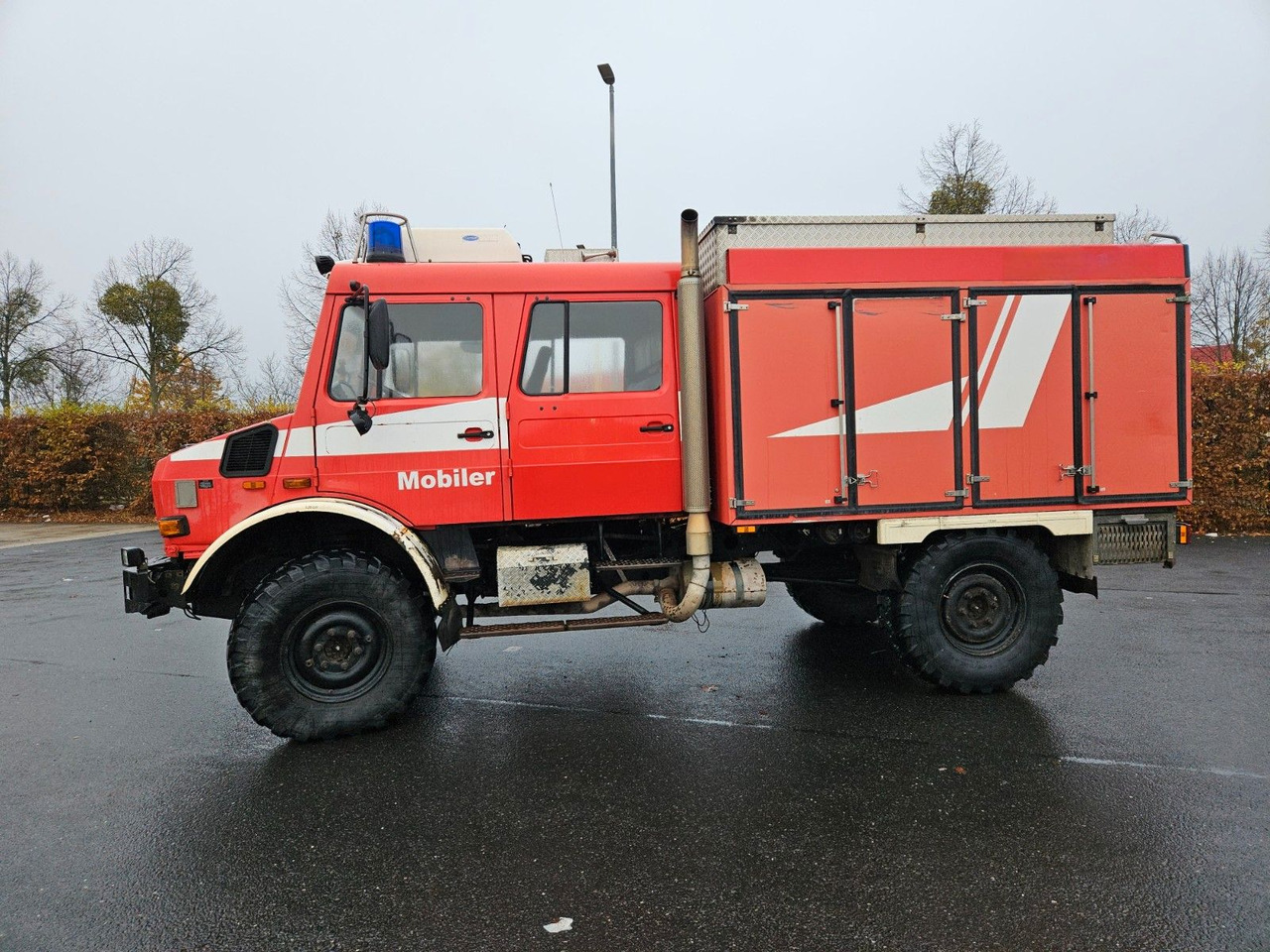Unimog U4000 4x4 DOKA Tanklöschfahrzeug Feuerwehr - Tankwagen: das Bild 3 Unimog U4000 4x4 DOKA Tanklöschfahrzeug Feuerwehr - Tankwagen: das Bild 3