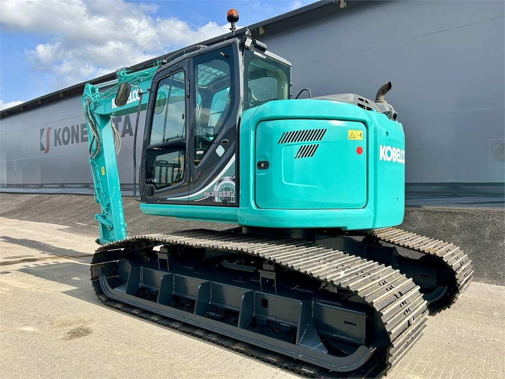 Kobelco SK140SRL-5 JATKETTU SUOALUSTA TULOSSA - Kettenbagger: das Bild 2 Kobelco SK140SRL-5 JATKETTU SUOALUSTA TULOSSA - Kettenbagger: das Bild 2