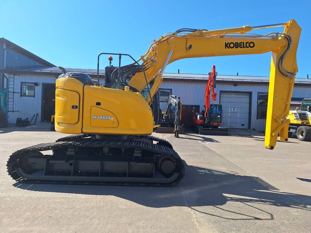 Kobelco SK140SRLC-7 KOROTETTU SUOALUSTA 900MM - Kettenbagger: das Bild 5 Kobelco SK140SRLC-7 KOROTETTU SUOALUSTA 900MM - Kettenbagger: das Bild 5