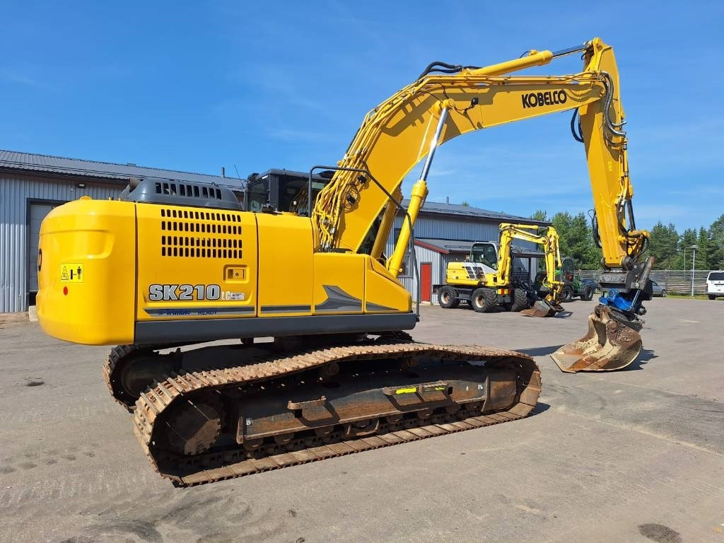 Kobelco SK210LC-11 PYÖRITTÄJÄLLÄ - Kettenbagger: das Bild 4 Kobelco SK210LC-11 PYÖRITTÄJÄLLÄ - Kettenbagger: das Bild 4