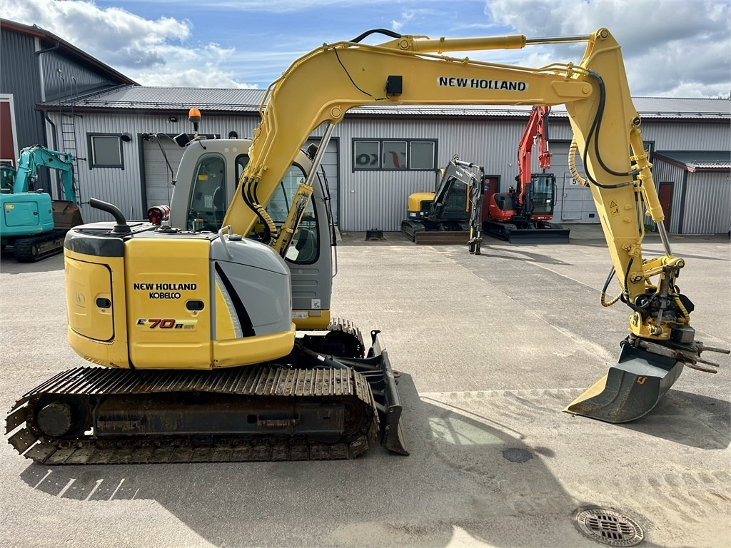 New Holland E 70BSR 2D MITTALAITTEET - Minibagger: das Bild 5 New Holland E 70BSR 2D MITTALAITTEET - Minibagger: das Bild 5