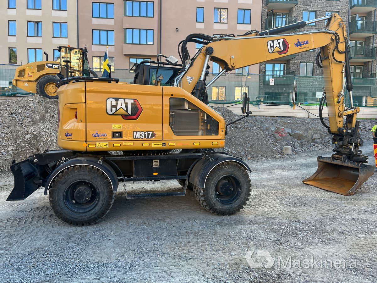 CAT M317 Hjulgrävare CAT M317 - Kettenbagger: das Bild 4 CAT M317 Hjulgrävare CAT M317 - Kettenbagger: das Bild 4
