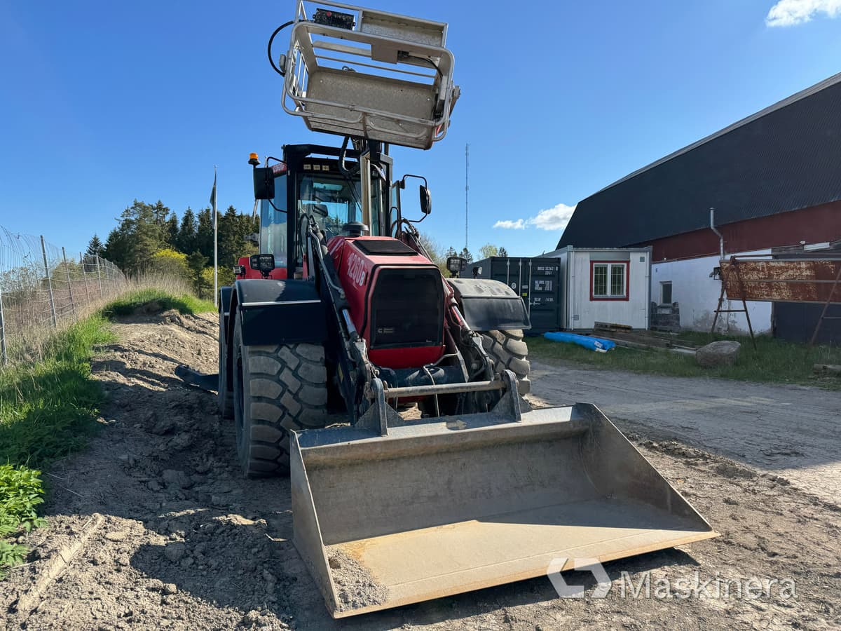Grävlastare Huddig 1260B - Baggerlader: das Bild 2 Grävlastare Huddig 1260B - Baggerlader: das Bild 2