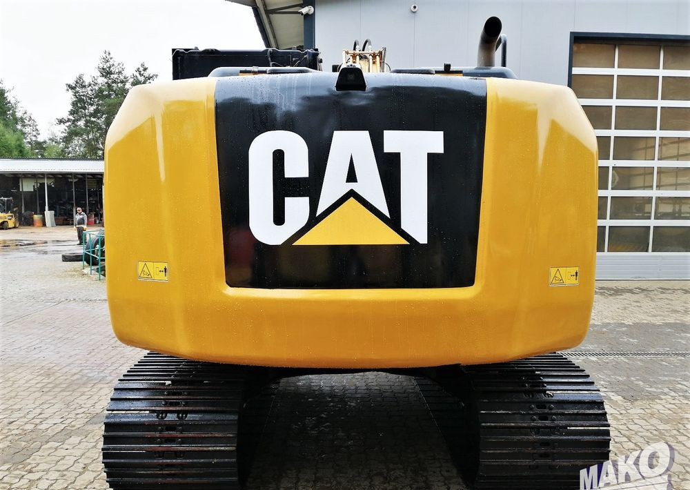 Caterpillar 312E - Kettenbagger: das Bild 4 Caterpillar 312E - Kettenbagger: das Bild 4