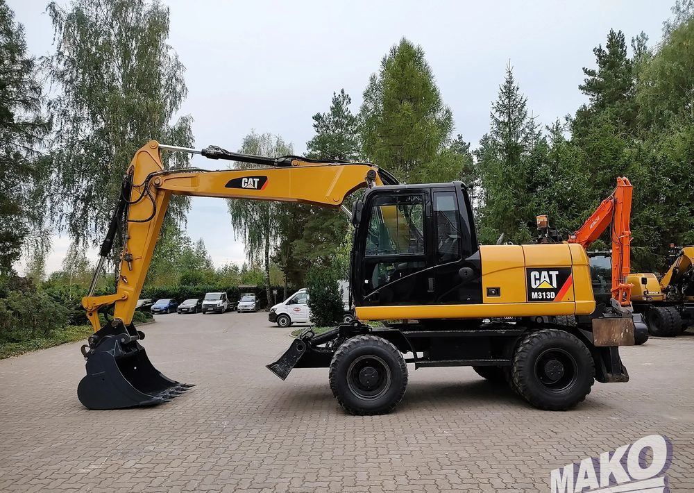 Caterpillar M313D - Mobilbagger: das Bild 1 Caterpillar M313D - Mobilbagger: das Bild 1