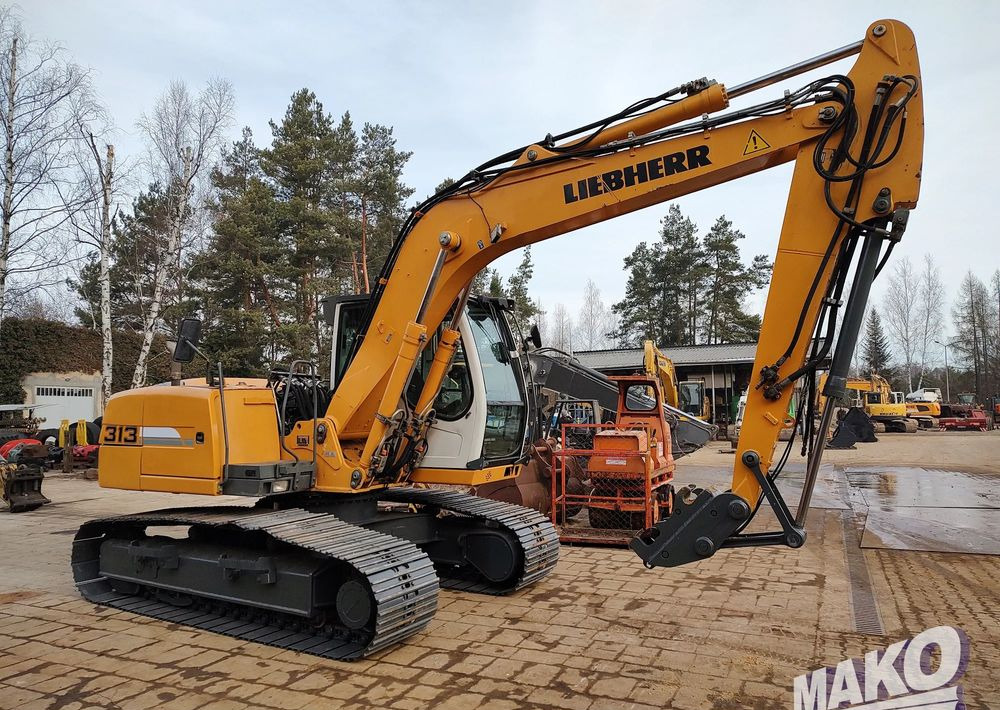 Liebherr R 313 Litronic - Kettenbagger: das Bild 3 Liebherr R 313 Litronic - Kettenbagger: das Bild 3