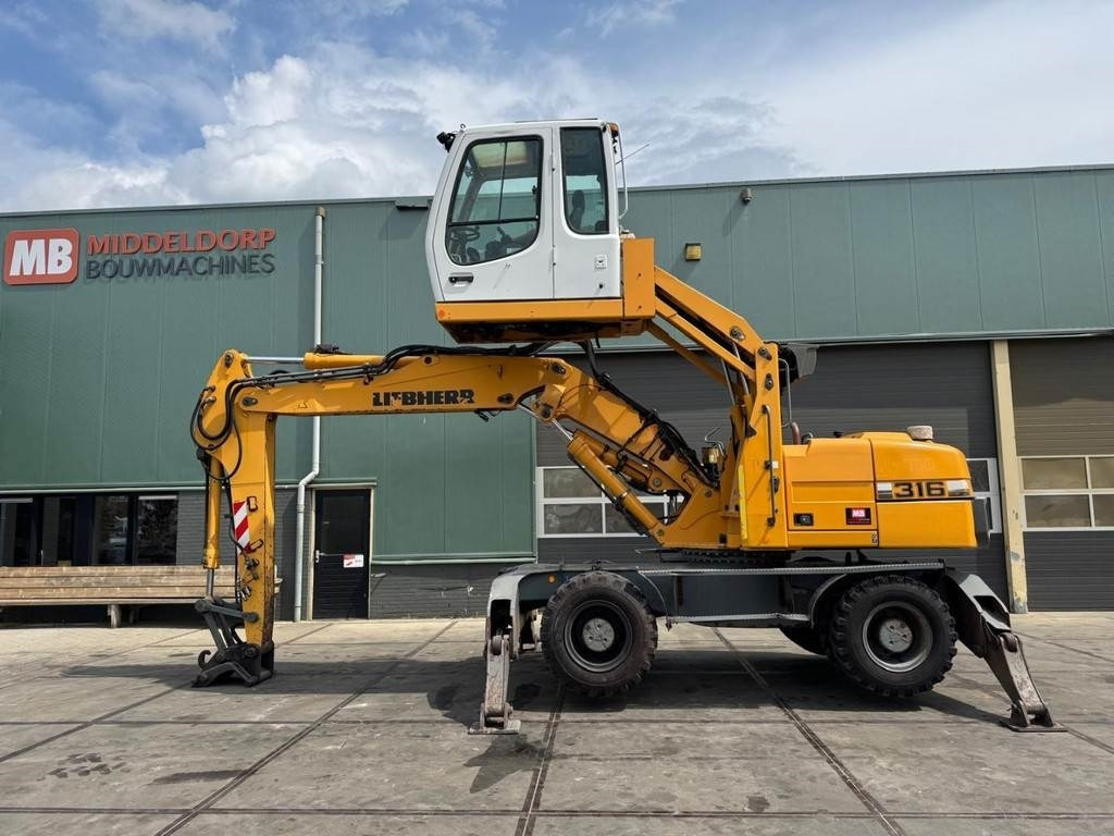 Liebherr A 316 - Umschlagbagger: das Bild 1 Liebherr A 316 - Umschlagbagger: das Bild 1