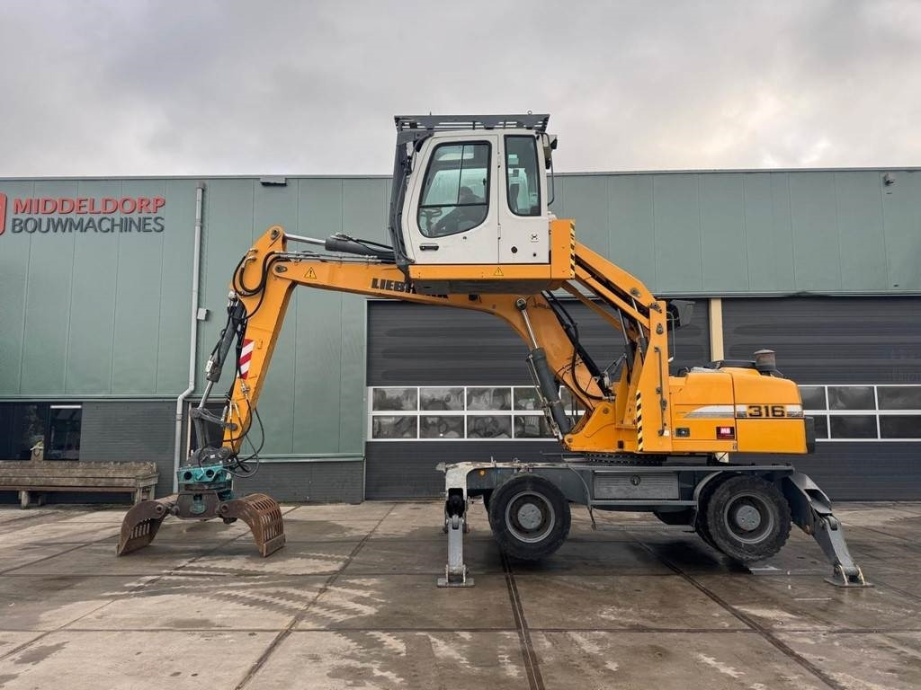 Liebherr A 316 - Umschlagbagger: das Bild 1 Liebherr A 316 - Umschlagbagger: das Bild 1