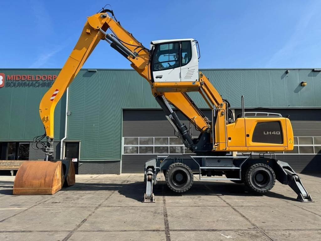 Liebherr LH 40 M - Umschlagbagger: das Bild 1 Liebherr LH 40 M - Umschlagbagger: das Bild 1
