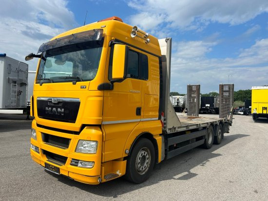 MAN TGX 26.440 Baggertransporter, Retarder, E5 - Pritsche LKW: das Bild 1 MAN TGX 26.440 Baggertransporter, Retarder, E5 - Pritsche LKW: das Bild 1