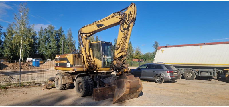 Caterpillar M 315 Rototilt - Mobilbagger: das Bild 1 Caterpillar M 315 Rototilt - Mobilbagger: das Bild 1