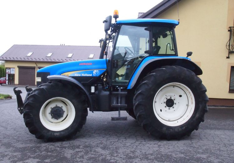 Ciągnik New Holland TM 140 2004 Przedni TUZ - Traktor: das Bild 5 Ciągnik New Holland TM 140 2004 Przedni TUZ - Traktor: das Bild 5