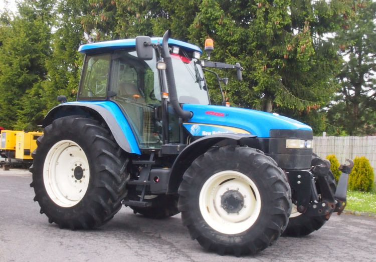 Ciągnik New Holland TM 140 2004 Przedni TUZ - Traktor: das Bild 1 Ciągnik New Holland TM 140 2004 Przedni TUZ - Traktor: das Bild 1