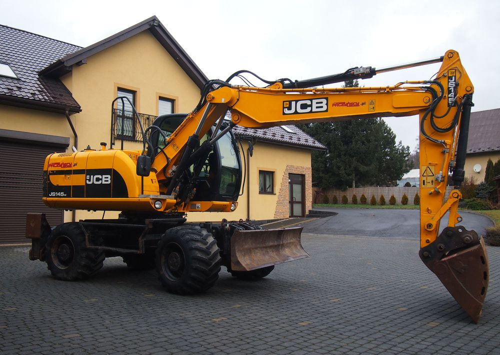 Koparka kołowa JCB JS145W 2011 Koparka JCB - Mobilbagger: das Bild 1 Koparka kołowa JCB JS145W 2011 Koparka JCB - Mobilbagger: das Bild 1