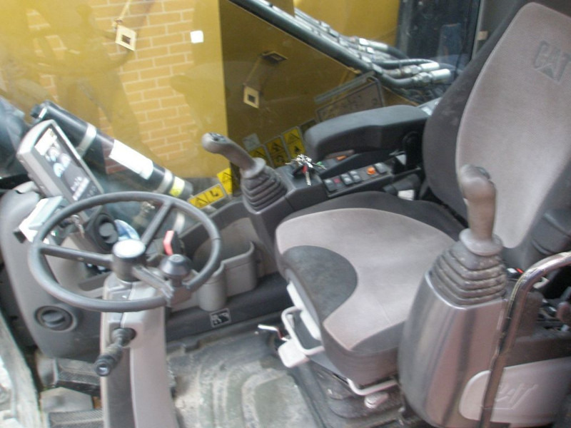 Mobilbagger Caterpillar M318D: das Bild 7