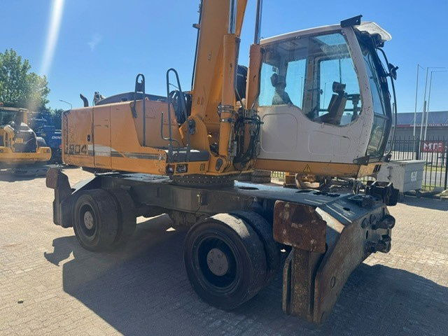 Liebherr A 904 C Litronic + Grab - Umschlagbagger: das Bild 5 Liebherr A 904 C Litronic + Grab - Umschlagbagger: das Bild 5