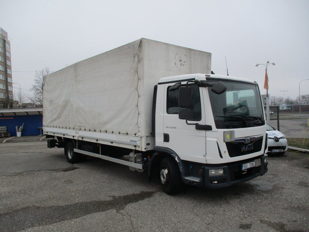 MAN TGL 12.250 - Plane LKW: das Bild 1 MAN TGL 12.250 - Plane LKW: das Bild 1