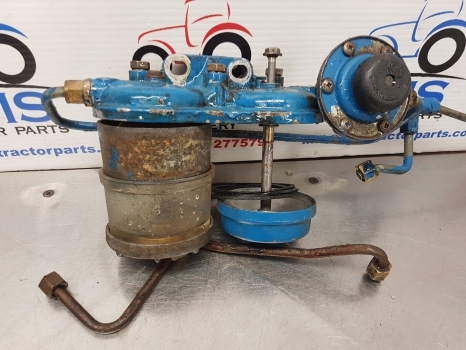 Ford 4830, 5030, 6610, 7710 Fuel Filter Support 83977042, E8nn9n166ab - Kraftstofffilter für Landmaschine: das Bild 3 Ford 4830, 5030, 6610, 7710 Fuel Filter Support 83977042, E8nn9n166ab - Kraftstofffilter für Landmaschine: das Bild 3