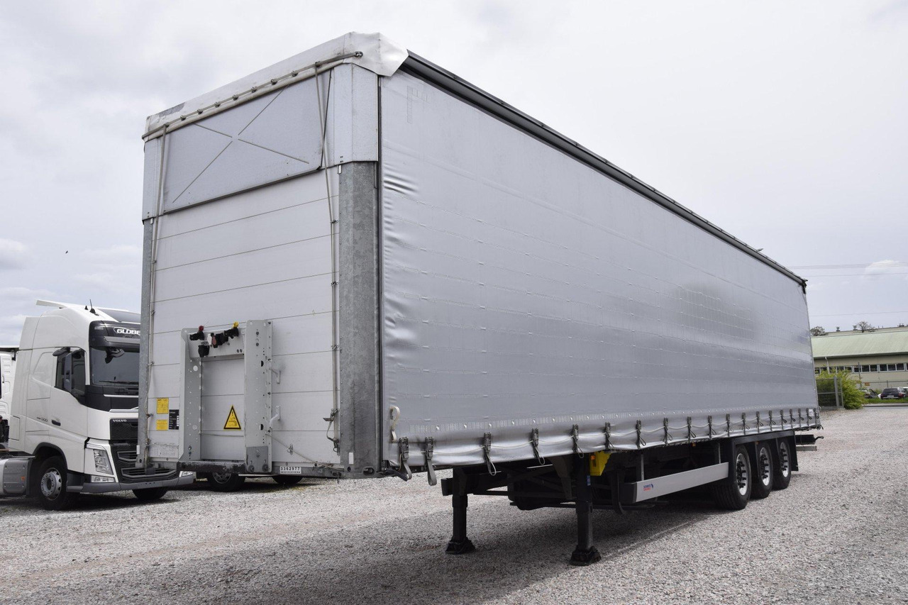 Schmitz Cargobull SCS24/L Varios - Planenauflieger: das Bild 1 Schmitz Cargobull SCS24/L Varios - Planenauflieger: das Bild 1