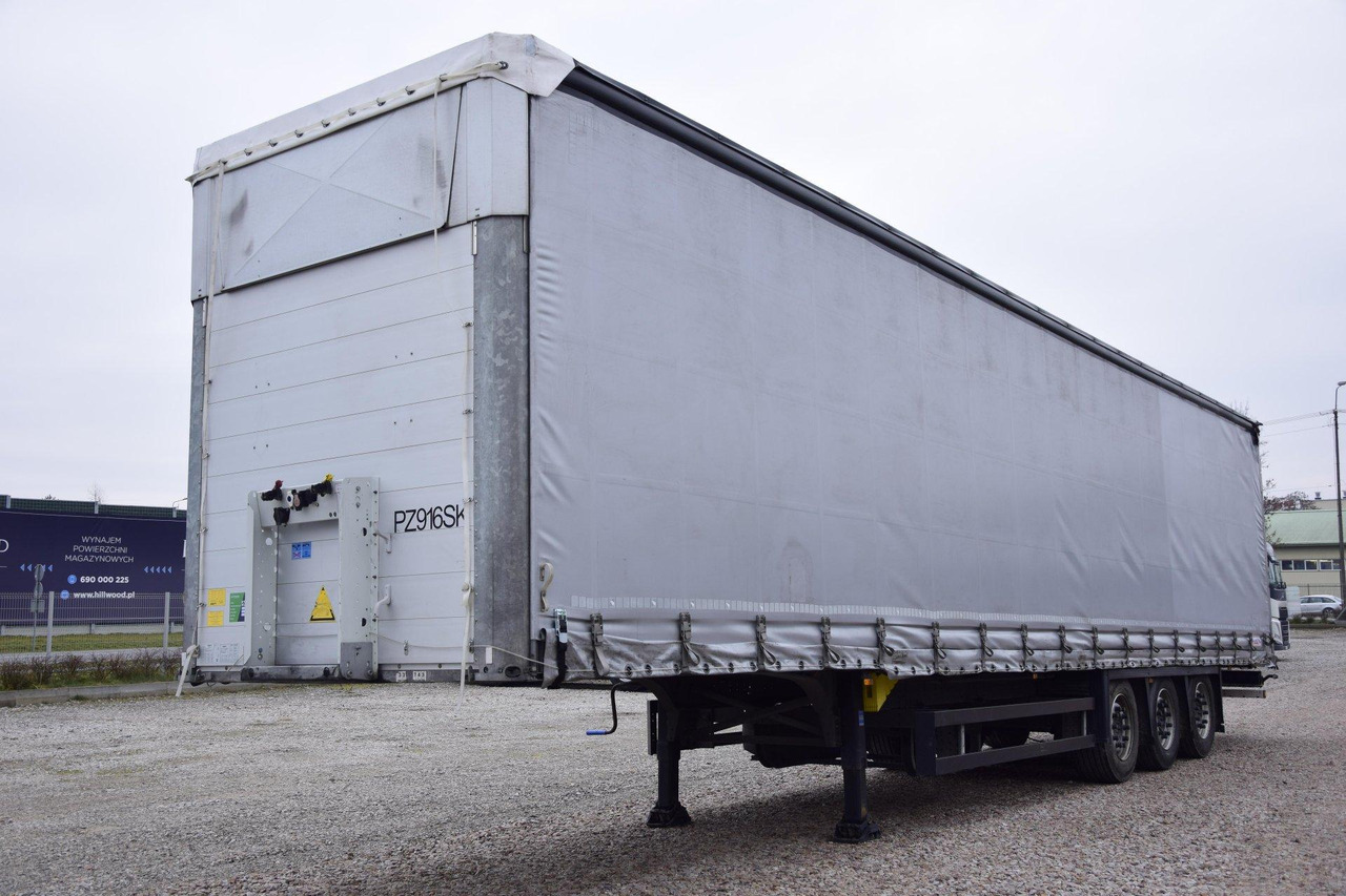 Schmitz Cargobull SCS24/L Varios - Planenauflieger: das Bild 1 Schmitz Cargobull SCS24/L Varios - Planenauflieger: das Bild 1