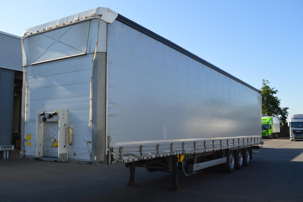 Schmitz Cargobull SCS24/L Varios - Planenauflieger: das Bild 1 Schmitz Cargobull SCS24/L Varios - Planenauflieger: das Bild 1