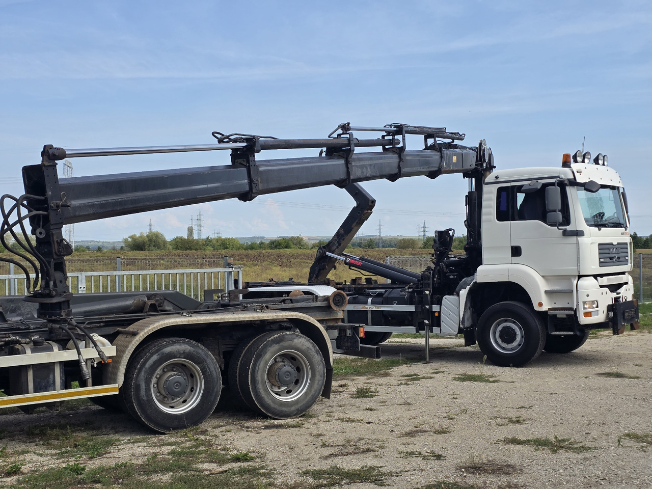 MAN TGA 26.440 6X6 / HOOK SYSTEM / HIAB 166D REMOTE - Abrollkipper, Autokran: das Bild 4 MAN TGA 26.440 6X6 / HOOK SYSTEM / HIAB 166D REMOTE - Abrollkipper, Autokran: das Bild 4