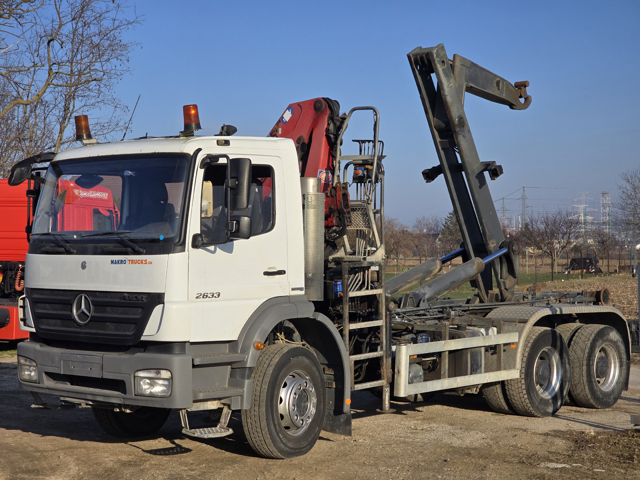 MERCEDES-BENZ AXOR 2633 6X4 / HOOK SYSTEM / HMF 1066 - Abrollkipper, Autokran: das Bild 2 MERCEDES-BENZ AXOR 2633 6X4 / HOOK SYSTEM / HMF 1066 - Abrollkipper, Autokran: das Bild 2