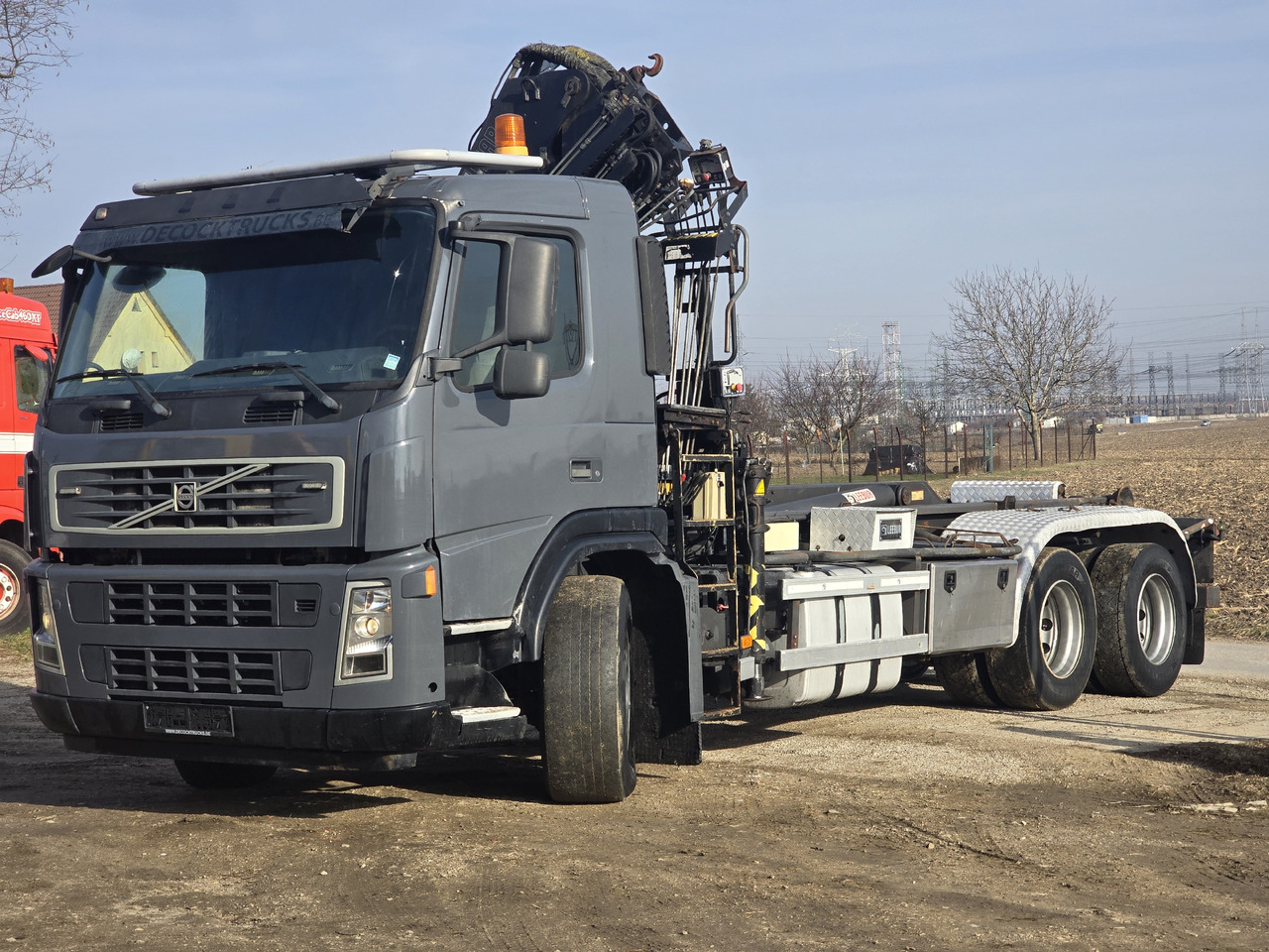 VOLVO FM 380 HOOK SYSTEM / HIAB 166 D2 DUO - Abrollkipper: das Bild 1 VOLVO FM 380 HOOK SYSTEM / HIAB 166 D2 DUO - Abrollkipper: das Bild 1