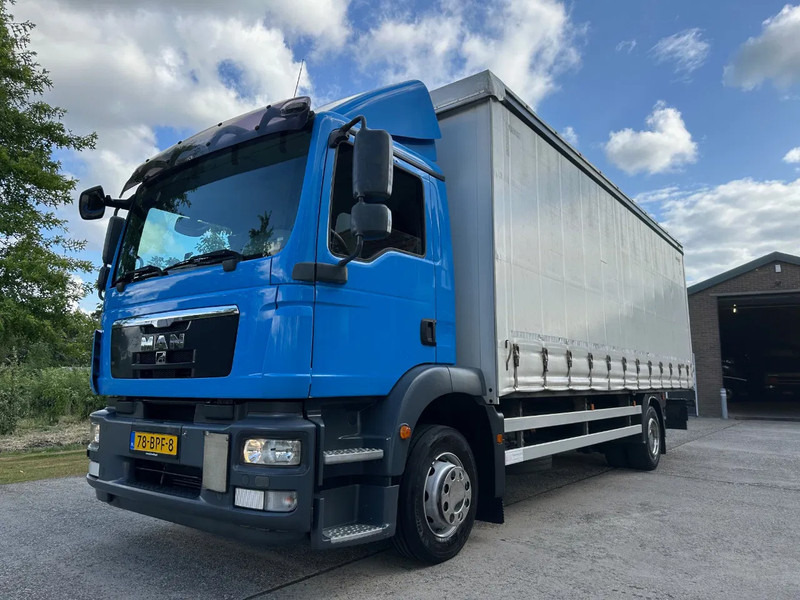 MAN TGM 15.250 / NL TRUCK / EURO 5 / SLIDING ROOF / BOX + TAILLIFT / FULL AIR / NAVI - Koffer LKW: das Bild 1 MAN TGM 15.250 / NL TRUCK / EURO 5 / SLIDING ROOF / BOX + TAILLIFT / FULL AIR / NAVI - Koffer LKW: das Bild 1