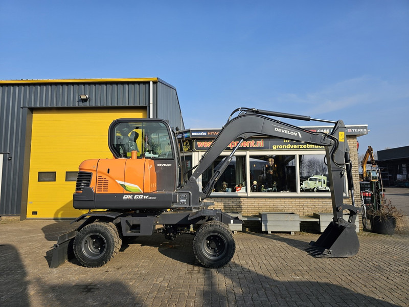 Develon DX60WN ECO-1 - Mobilbagger: das Bild 5 Develon DX60WN ECO-1 - Mobilbagger: das Bild 5