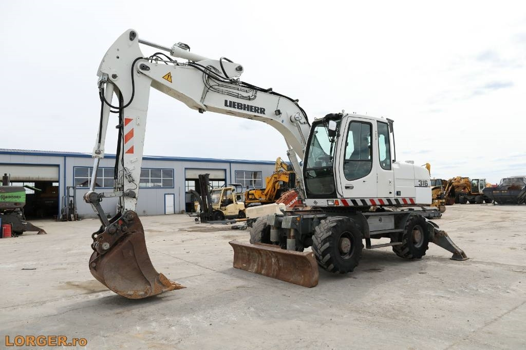 Liebherr A 316 Litronic - Mobilbagger: das Bild 5 Liebherr A 316 Litronic - Mobilbagger: das Bild 5