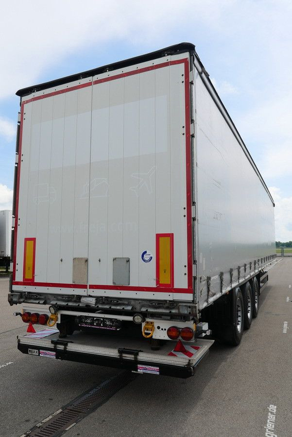 Schmitz Cargobull SCS 24/ LBW 2000 kg / RUNGENTASCHEN / HUBDACH - Planenauflieger: das Bild 4 Schmitz Cargobull SCS 24/ LBW 2000 kg / RUNGENTASCHEN / HUBDACH - Planenauflieger: das Bild 4