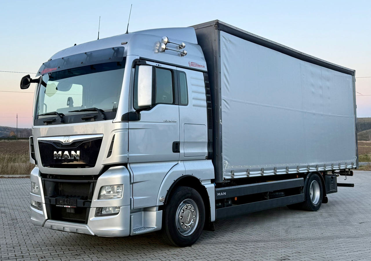 MAN TGX 18.400 / FIRANKA / KONTENER / NISKI PRZEBIEG / EURO 6 / AUTOMAT / SYPIALKA / 2016 ROK - Plane LKW: das Bild 2 MAN TGX 18.400 / FIRANKA / KONTENER / NISKI PRZEBIEG / EURO 6 / AUTOMAT / SYPIALKA / 2016 ROK - Plane LKW: das Bild 2