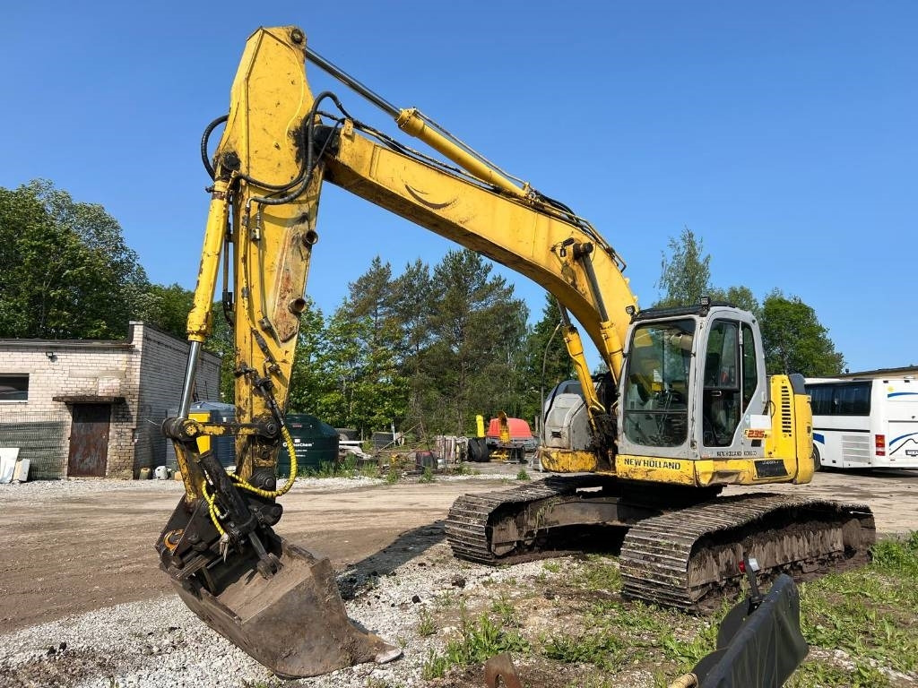 NEW HOLLAND KOBELCO E235BSRLC-2 - Kettenbagger: das Bild 1 NEW HOLLAND KOBELCO E235BSRLC-2 - Kettenbagger: das Bild 1