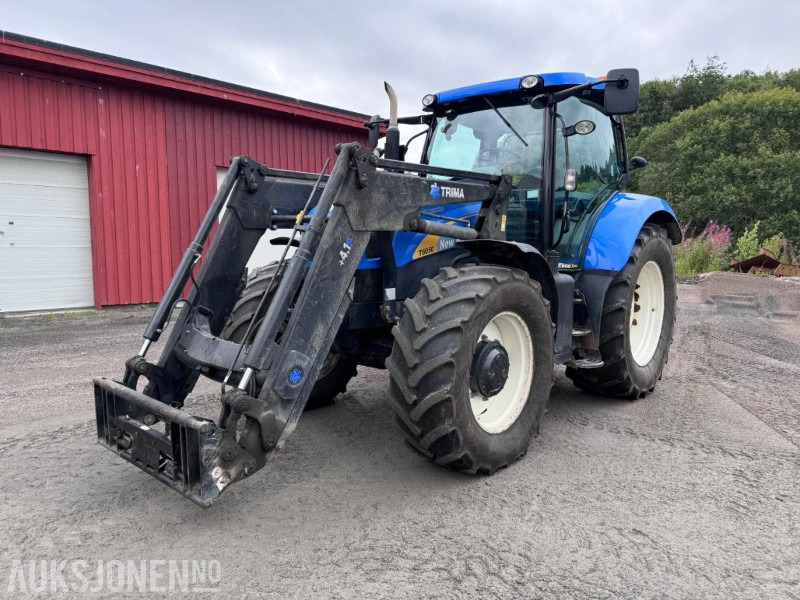 2012 New Holland T6050 med Trima +4.1P frontlaster og panser beskytter - 40 km/t - Traktor: das Bild 1 2012 New Holland T6050 med Trima +4.1P frontlaster og panser beskytter - 40 km/t - Traktor: das Bild 1