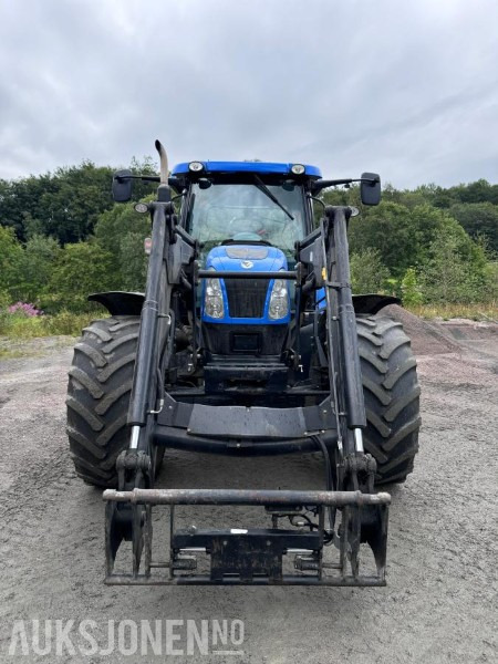 2012 New Holland T6050 med Trima +4.1P frontlaster og panser beskytter - 40 km/t - Traktor: das Bild 2 2012 New Holland T6050 med Trima +4.1P frontlaster og panser beskytter - 40 km/t - Traktor: das Bild 2