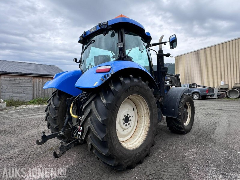 2012 New Holland T6050 med Trima +4.1P frontlaster og panser beskytter - 40 km/t - Traktor: das Bild 4 2012 New Holland T6050 med Trima +4.1P frontlaster og panser beskytter - 40 km/t - Traktor: das Bild 4