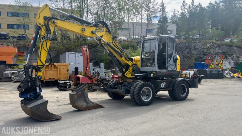 Bagger 2015 Wacker Neuson EW100 Gravemaskin / Hjulgraver Tiltrotator Pusseskuffe Kabelskuffe 3224 timer: das Bild 1
