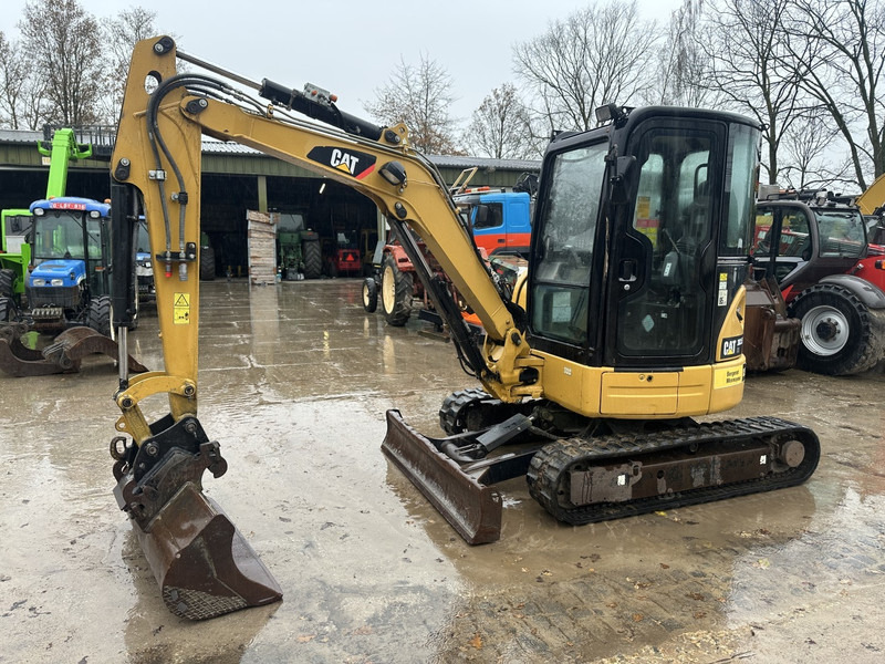 Caterpillar 303.5E CR All functions 3 buckets - Minibagger: das Bild 1 Caterpillar 303.5E CR All functions 3 buckets - Minibagger: das Bild 1