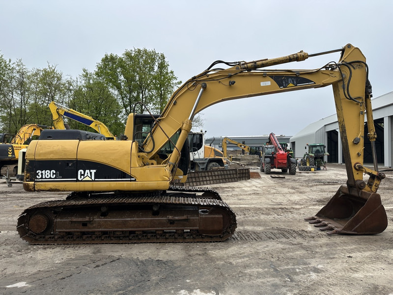 Caterpillar 318 CL - Kettenbagger: das Bild 4 Caterpillar 318 CL - Kettenbagger: das Bild 4