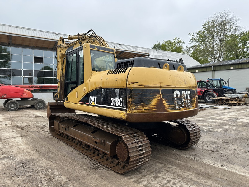 Caterpillar 318 CL - Kettenbagger: das Bild 5 Caterpillar 318 CL - Kettenbagger: das Bild 5