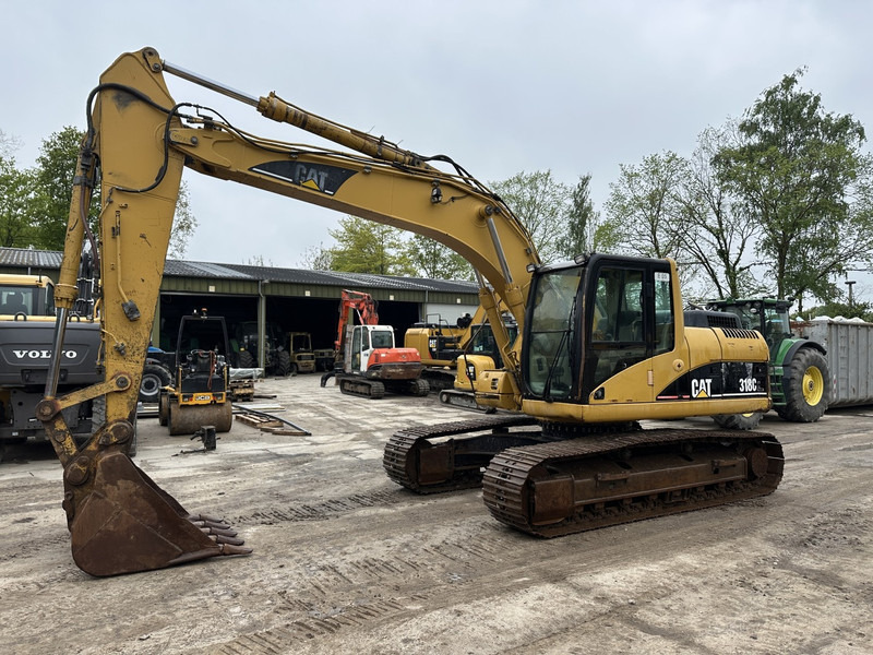 Caterpillar 318 CL (not 320CL - 325CL) - Kettenbagger: das Bild 1 Caterpillar 318 CL (not 320CL - 325CL) - Kettenbagger: das Bild 1