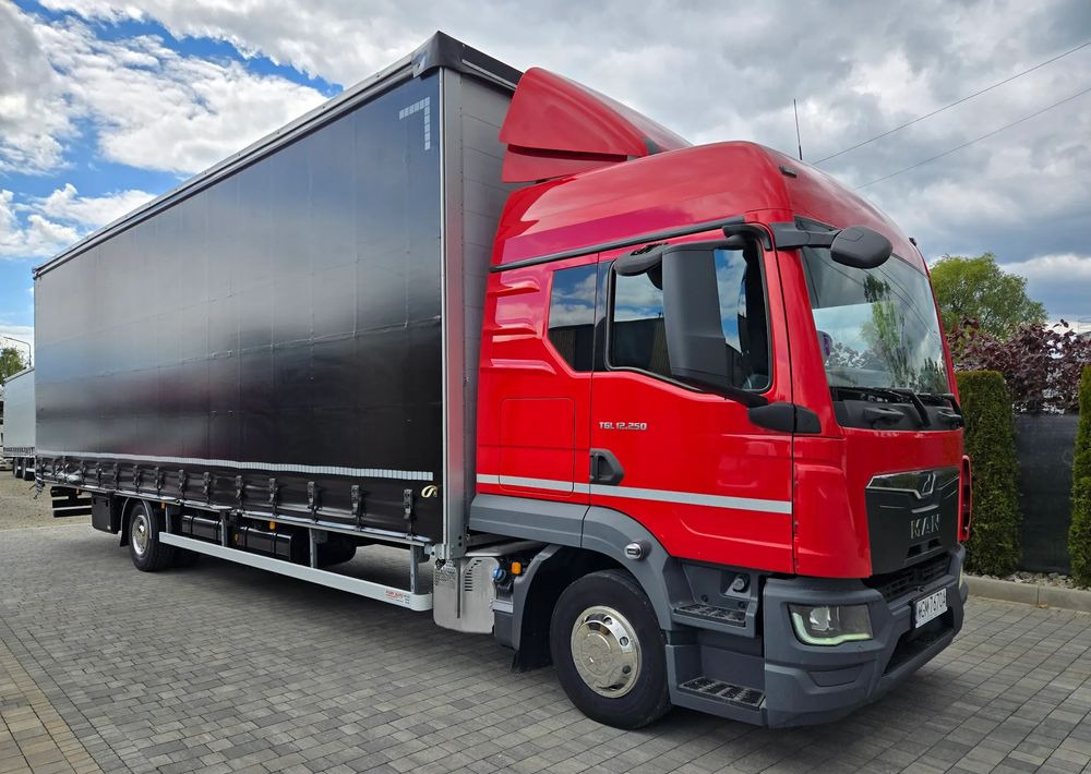 MAN TGL 12.250 - Plane LKW: das Bild 3 MAN TGL 12.250 - Plane LKW: das Bild 3