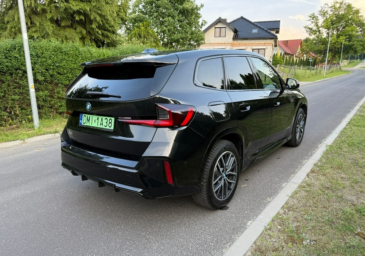BMW X1 iX1 iX1 xDrive30 313KM M-Sport H/K Panorama AdaptiveLed Masaże Kam360 - SUV/ Geländewagen: das Bild 4 BMW X1 iX1 iX1 xDrive30 313KM M-Sport H/K Panorama AdaptiveLed Masaże Kam360 - SUV/ Geländewagen: das Bild 4