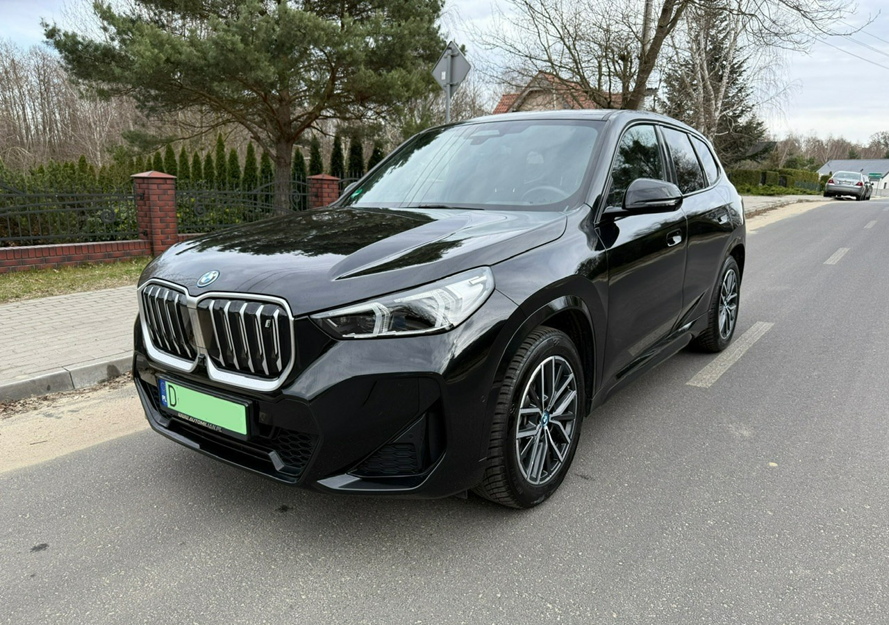 BMW X1 iX1 iX1 xDrive30 313KM M-Sport H/K Panorama AdaptiveLed Masaże Kam360 - SUV/ Geländewagen: das Bild 1 BMW X1 iX1 iX1 xDrive30 313KM M-Sport H/K Panorama AdaptiveLed Masaże Kam360 - SUV/ Geländewagen: das Bild 1