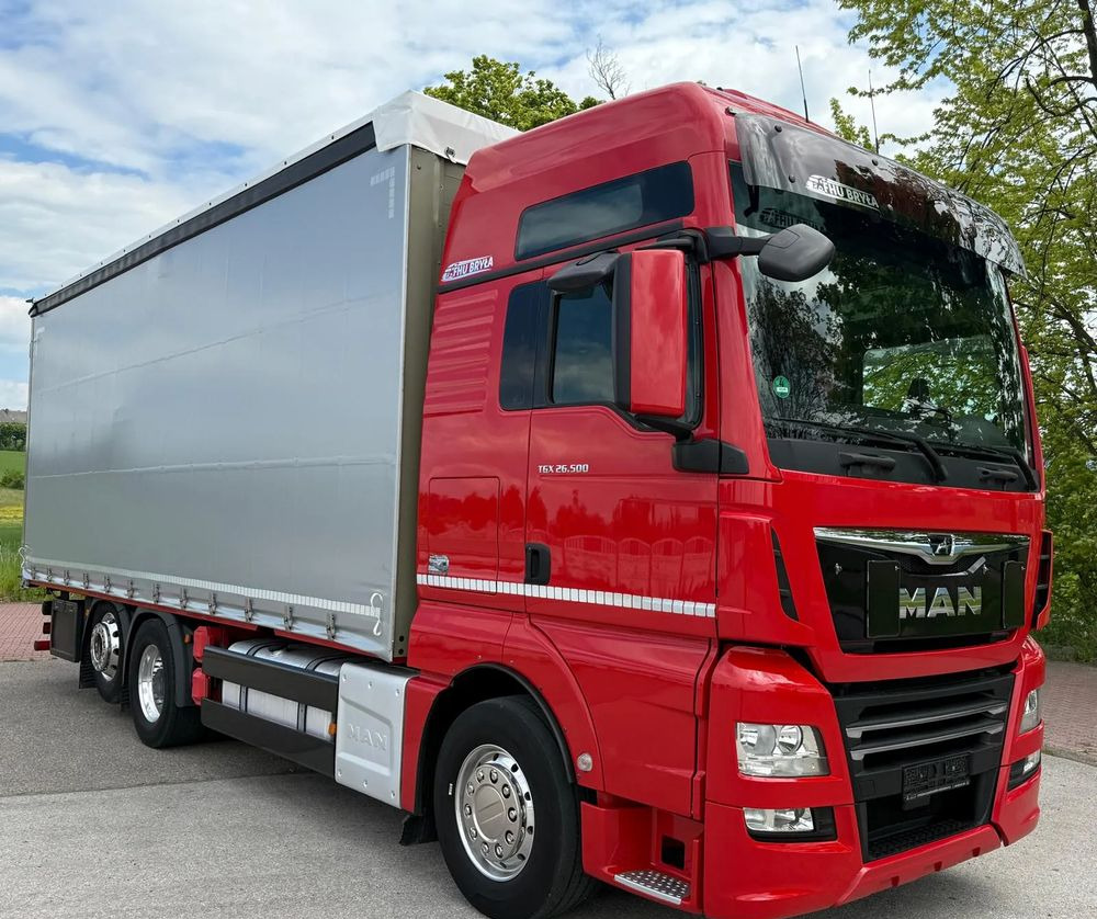 MAN TGX 26.500/LIFT/6X2/KLIMA POSTOJOWA/18PALET/E6/FIRANKA/WINDA/NISKI PRZEBIEG/JEDEN WŁAŚCICIEL/PODWIESZANA OŚ - Plane LKW: das Bild 1 MAN TGX 26.500/LIFT/6X2/KLIMA POSTOJOWA/18PALET/E6/FIRANKA/WINDA/NISKI PRZEBIEG/JEDEN WŁAŚCICIEL/PODWIESZANA OŚ - Plane LKW: das Bild 1
