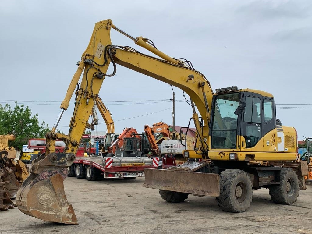 Komatsu PW 140-7 - Mobilbagger: das Bild 1 Komatsu PW 140-7 - Mobilbagger: das Bild 1