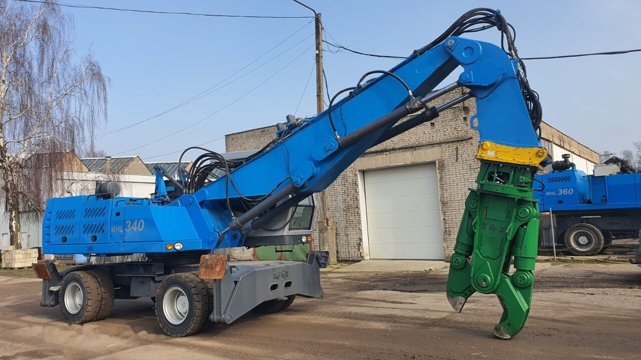 Fuchs MHL 340D FQC + LST 3to shear - Umschlagbagger: das Bild 5 Fuchs MHL 340D FQC + LST 3to shear - Umschlagbagger: das Bild 5