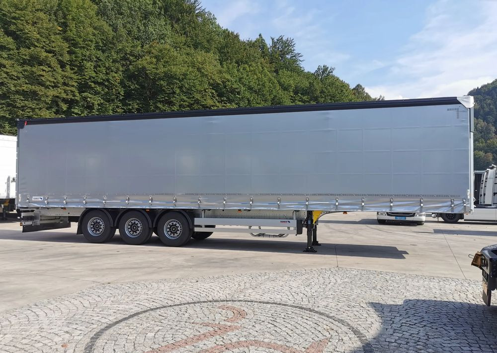 Schmitz Cargobull STANDARD + DACH VARIOS SIMPLE - Planenauflieger: das Bild 4 Schmitz Cargobull STANDARD + DACH VARIOS SIMPLE - Planenauflieger: das Bild 4